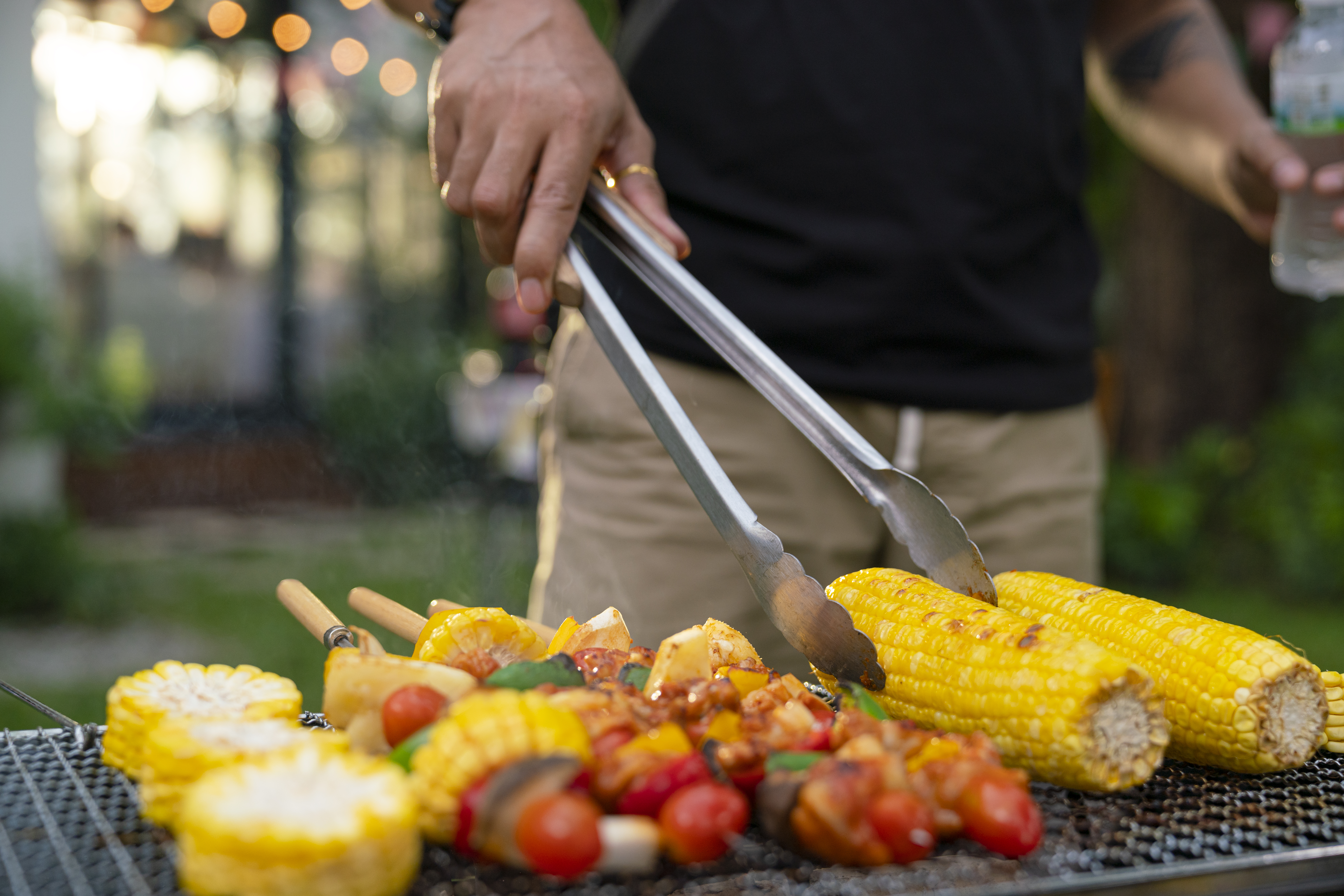 Person grilling outside